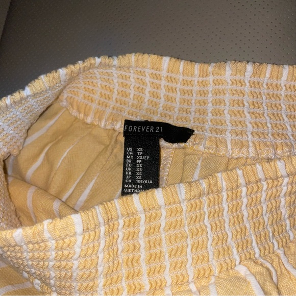 yellow flowy striped shorts - Picture 2 of 2